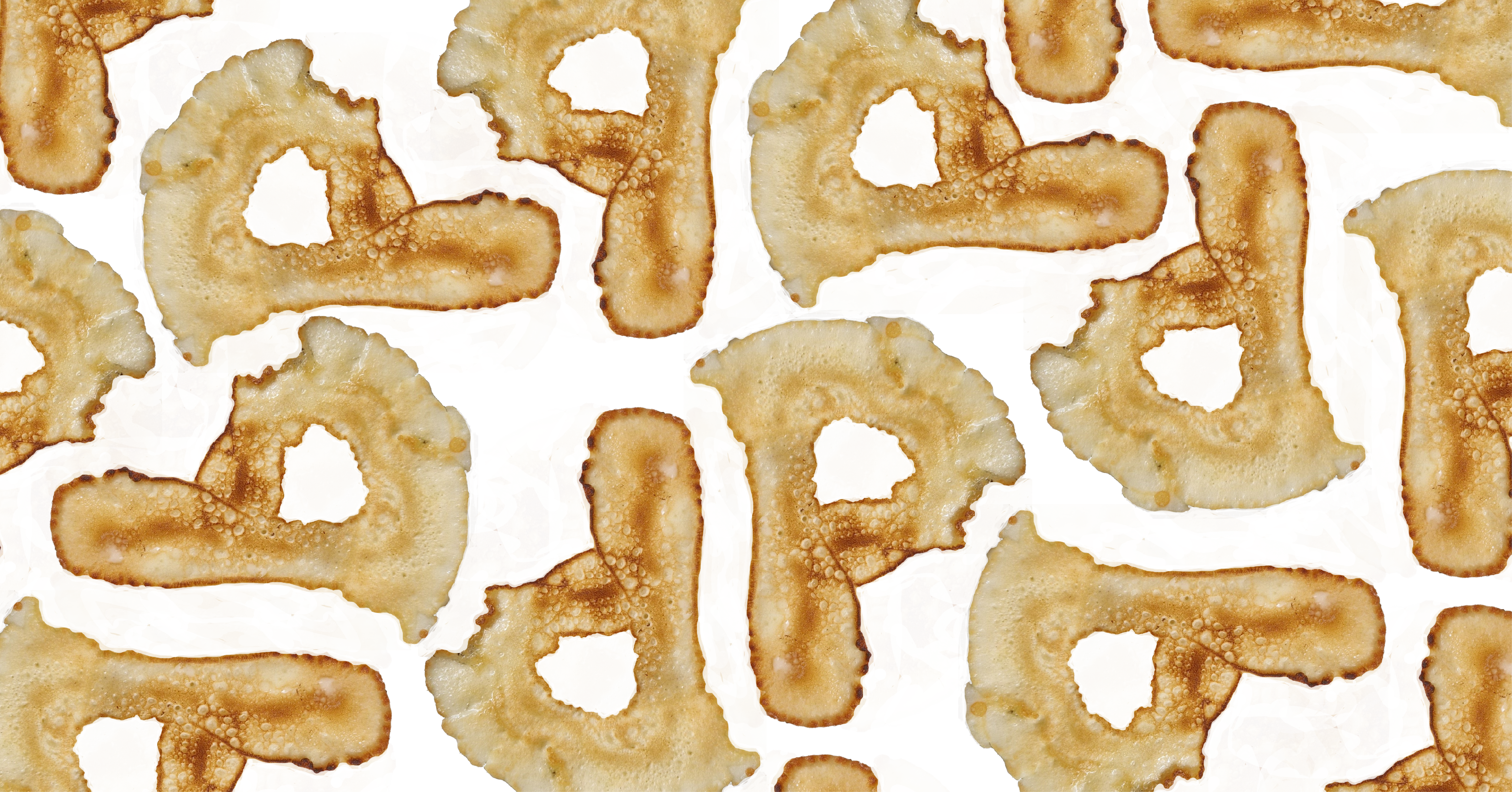 A pattern made out of copies of a single pancake that is shaped into a capital letter P. The copies are turned into various angles and placed beside eachother in order to create the pattern.